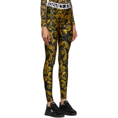 Shop Versace Jeans Couture Black And Gold Paisley Print Leggings In E899 Black