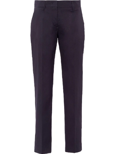 Shop Prada Stretch Slim-fit Trousers In Blue