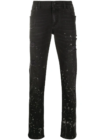 Shop Dolce & Gabbana Paint-splatter Slim-fit Jeans In Black