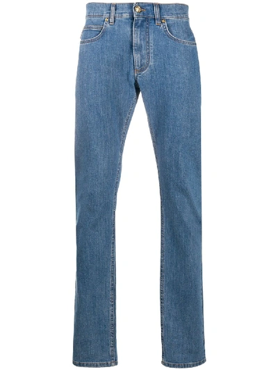 Shop Versace Logo-patch Straight-leg Jeans In Blue