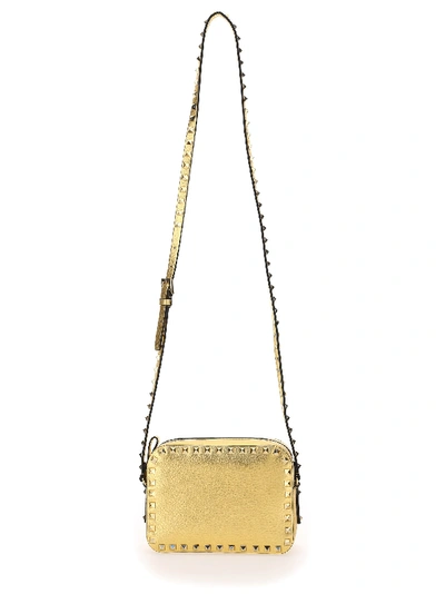 Shop Valentino Small Rockstud Crossbody Bag In Soft Gold