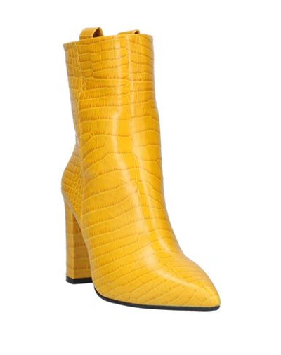 Shop The Seller Ankle Boot In Yellow