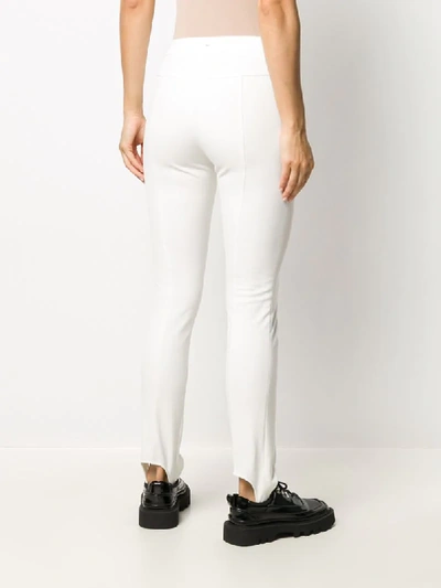 Shop Moncler Stirrup Cuffs Slim-fit Trousers In White