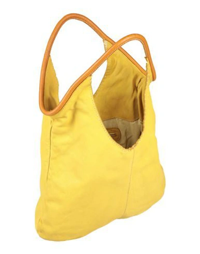 Shop Caterina Lucchi Handbags In Yellow