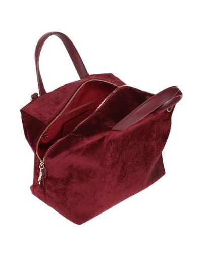 Shop Roberta Di Camerino Cross-body Bags In Maroon