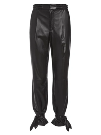 Shop Alice And Olivia Ivette Tapered Leather Pants In Black