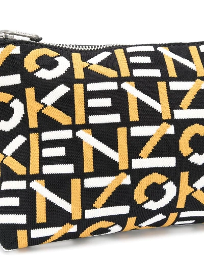 Shop Kenzo Logo-pattern Clutch Bag In Black