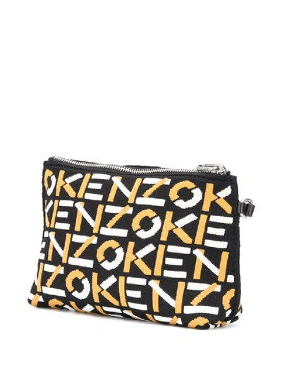 Shop Kenzo Logo-pattern Clutch Bag In Black