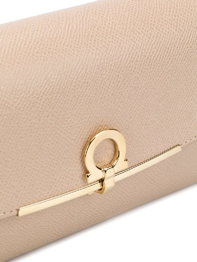 Shop Ferragamo Gancini Leather Clutch In Neutrals