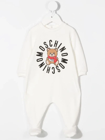 Shop Moschino Circular Logo Print Romper In White