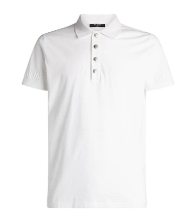 Shop Balmain Embossed Logo Polo Shirt