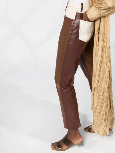 Shop Nanushka Vinni Vegan Leather Trousers In Brown