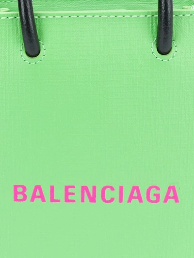 Shop Balenciaga Shopping Phone Holder Bag In Green