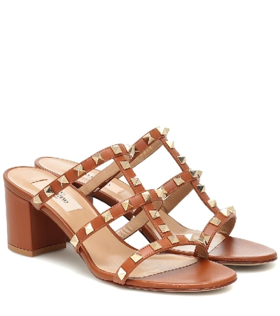 Shop Valentino Rockstud Leather Sandals In Brown