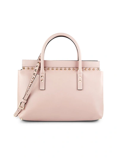 Shop Valentino Rockstud Leather Top Handle Bag In Blush