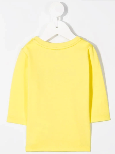 Shop Givenchy Logo Print Side Buttoned T-shirt In Yellow