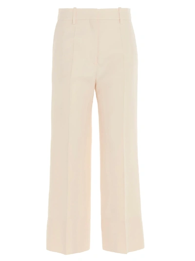 Shop Valentino Pants In White