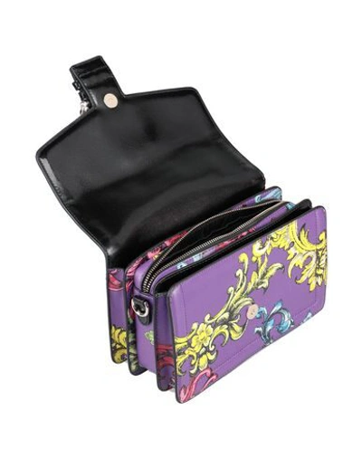 Shop Versace Jeans Handbags In Purple