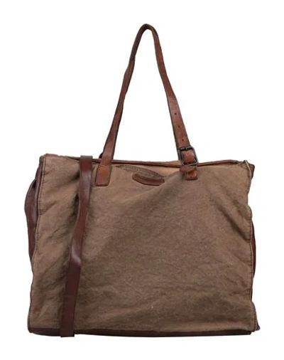 Shop Caterina Lucchi Handbags In Brown