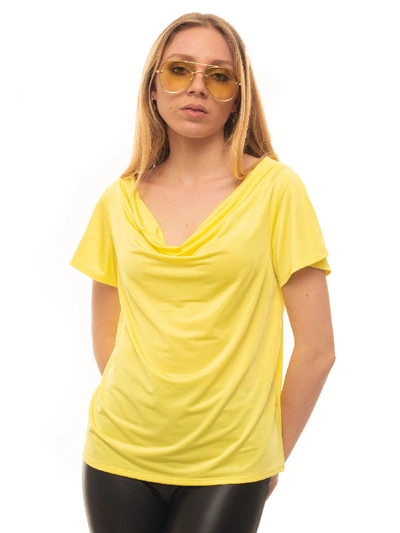 Shop Guess T-shirt Yellow Polyester Woman