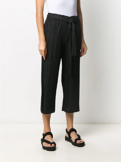 Shop Issey Miyake Trousers In Black