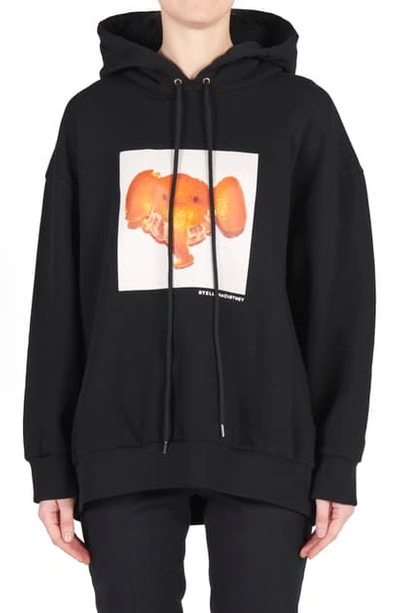 Shop Stella Mccartney Tangerine Elephant Logo Graphic Organic Cotton Hoodie In Black