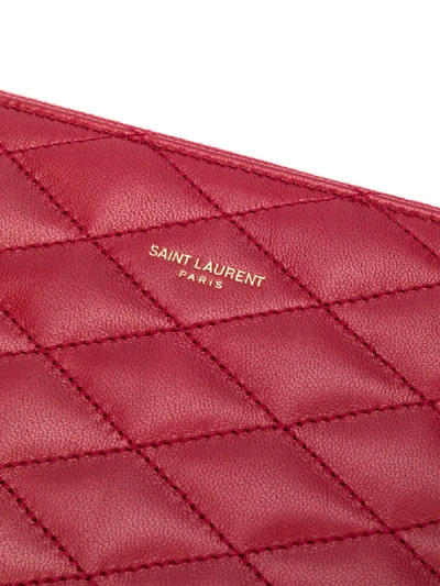Shop Saint Laurent Sade Quilted Clutch In Red