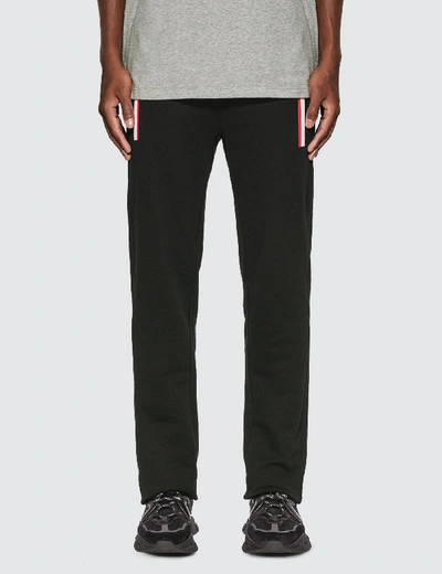 Shop Moncler Cotton Jersey Sweatpants In Black