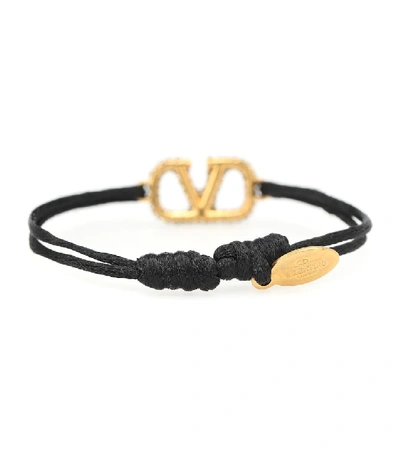 Shop Valentino Vlogo Crystal-embellished Cord Bracelet In Black