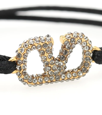Shop Valentino Vlogo Crystal-embellished Cord Bracelet In Black