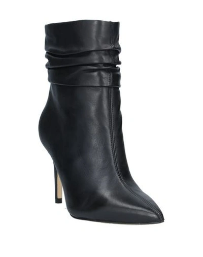 Shop Guess Ankle Boots In Black