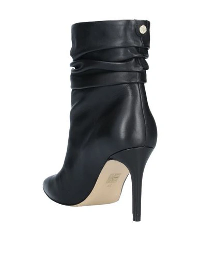 Shop Guess Ankle Boots In Black
