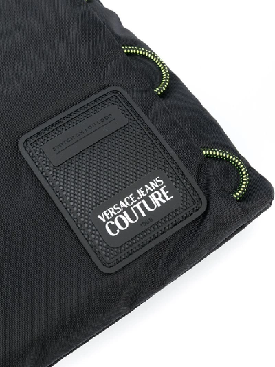Shop Versace Jeans Couture Logo Patch Messenger Bag In Black