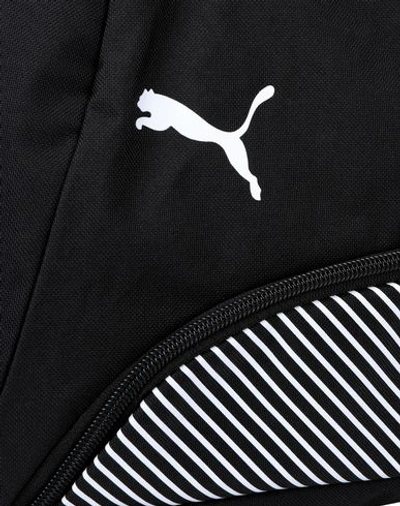 Shop Puma Duffel Bags In Black