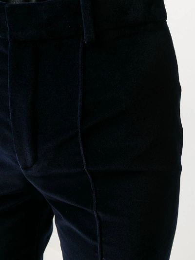 Shop Saint Laurent Velvet-effect Flared Trousers In Blue