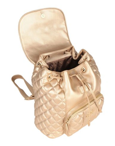 Shop Love Moschino Backpack & Fanny Pack In Gold