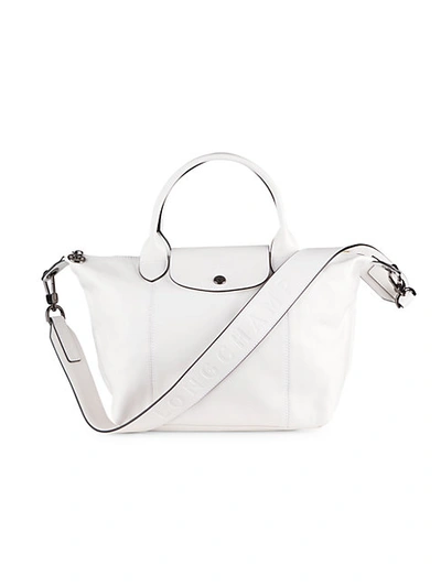 Shop Longchamp Le Pliage Leather Top Handle Bag In White