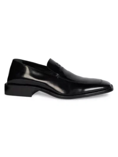 Shop Balenciaga Coin Rim Leather Loafers In Black