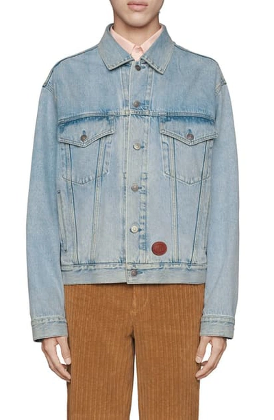 Shop Gucci Logo Leather Patch Washed Denim Jacket In Light Blue