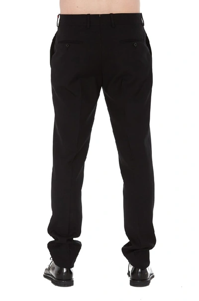 Shop Alexander Mcqueen Slashed Dart Trousers In Black