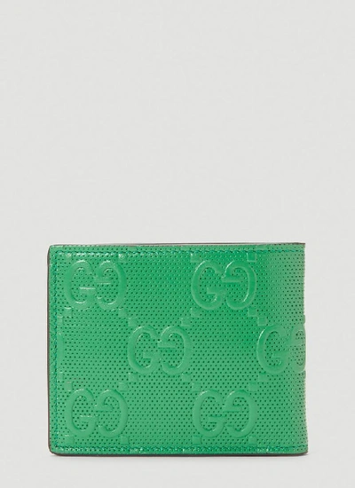 Shop Gucci Gg Embossed Wallet In Green