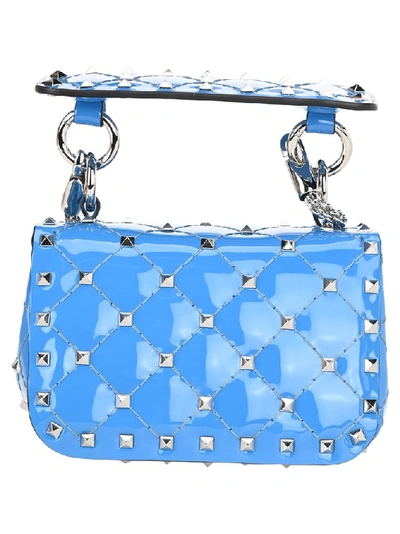Shop Valentino Garavani Rockstud Spike Micro Crossbody Bag In Blue