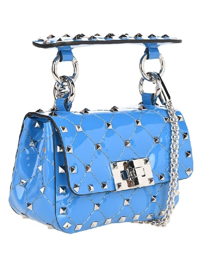 Shop Valentino Garavani Rockstud Spike Micro Crossbody Bag In Blue