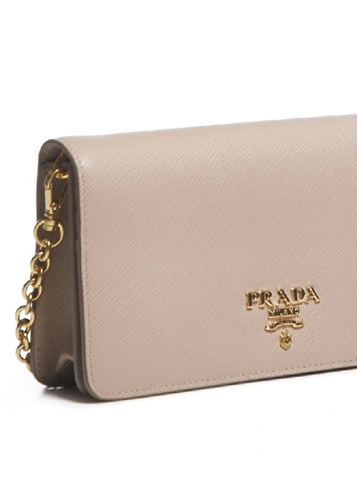 Shop Prada Logo Chain Clutch Bag In Pink