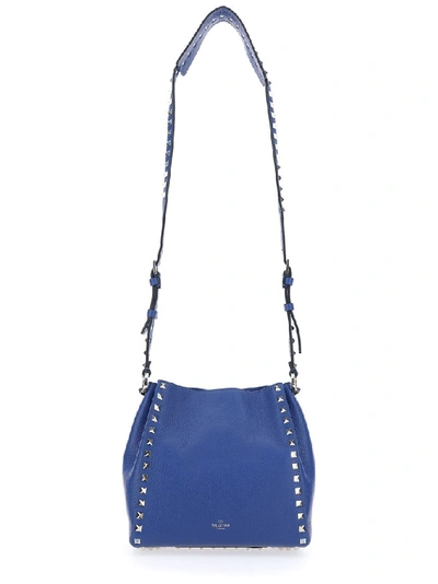 Shop Valentino Garavani Rockstud Bucket Bag In Blue