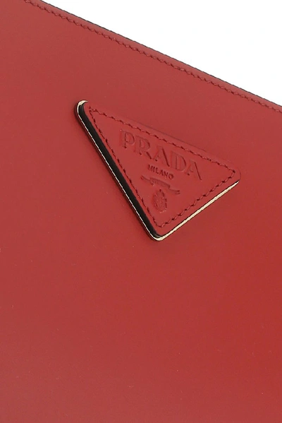 Shop Prada Logo Plaque Clutch Bag In Red