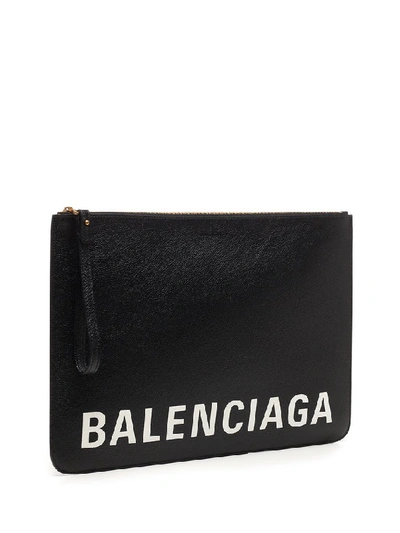 Shop Balenciaga Logo Clutch Bag In Black