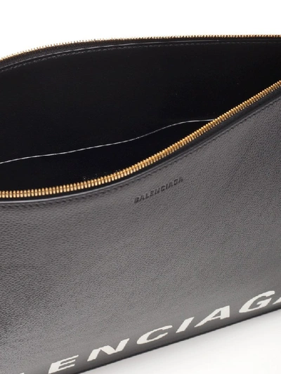 Shop Balenciaga Logo Clutch Bag In Black