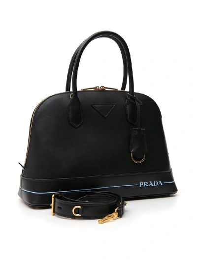 Shop Prada Logo Print Top Handle Bag In Black