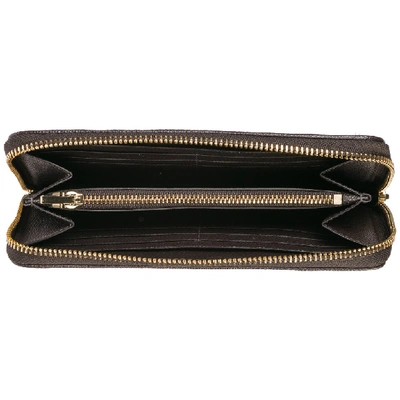 Shop Coach Signature Zip Around Wallet In Brown